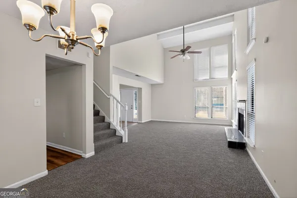 a view of a livingroom with a staircase