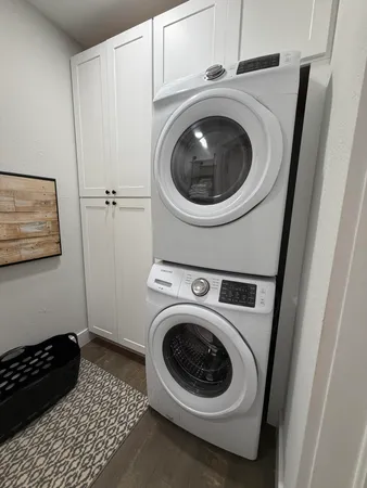 a utility room with dryer and washer