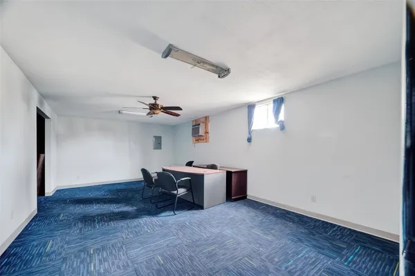 a view of a storage & utility room with closet fan