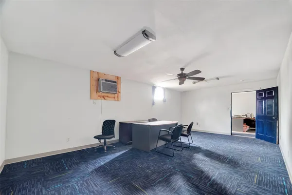 a room with furniture and wooden floor