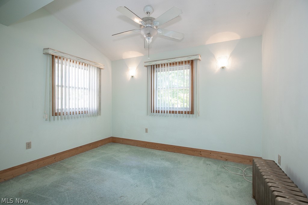 3571 Harvey Road Cleveland, OH 44118 - Photo 16 of 40 Bedroom with vaulted ceiling, carpet, and ceiling fan