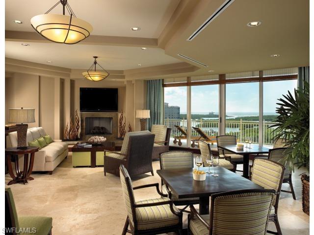13675 Vanderbilt Drive, Unit 1107 Naples, FL 34110 - Photo 15 of 23 a view of a dining room with furniture window and outside view