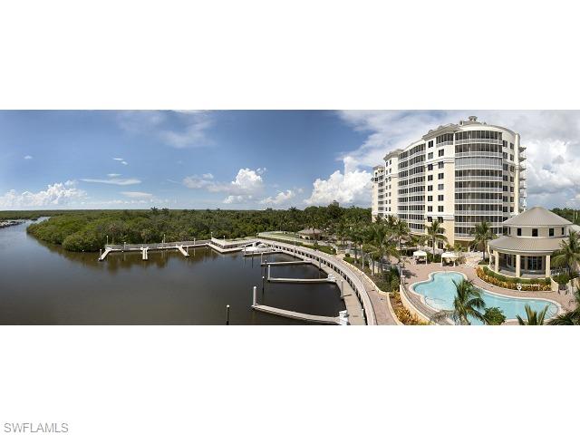 13675 Vanderbilt Drive, Unit 1107 Naples, FL 34110 - Photo 3 of 23 a black and white photo of a city