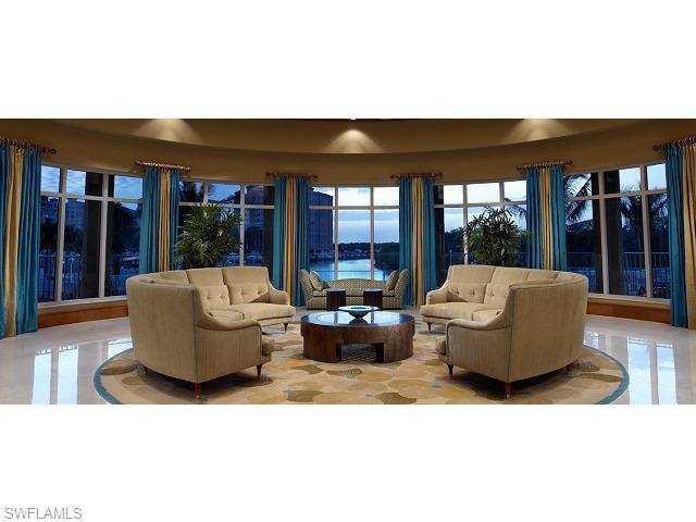 13675 Vanderbilt Drive, Unit 1107 Naples, FL 34110 - Photo 8 of 23 a living room with furniture and window