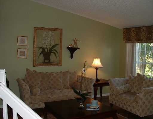 19714 Black Olive Lane Boca Raton, FL 33498 - Photo 4 of 6 a living room with furniture and a lamp