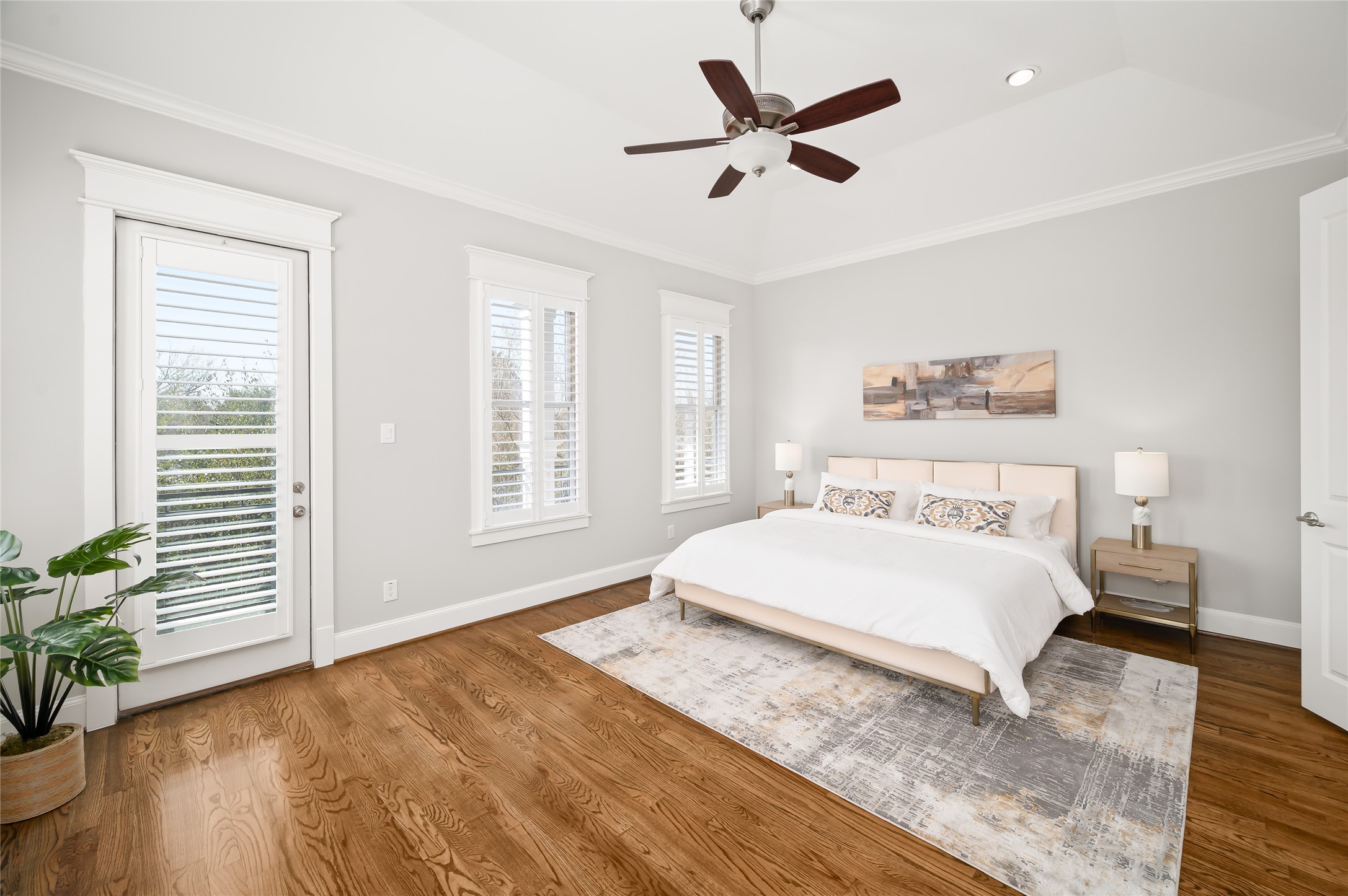 1003 East 25th Street Houston, TX 77009 - Photo 18 of 33 Located on the second floor the primary suite is flooded with light and has access to a private balcony