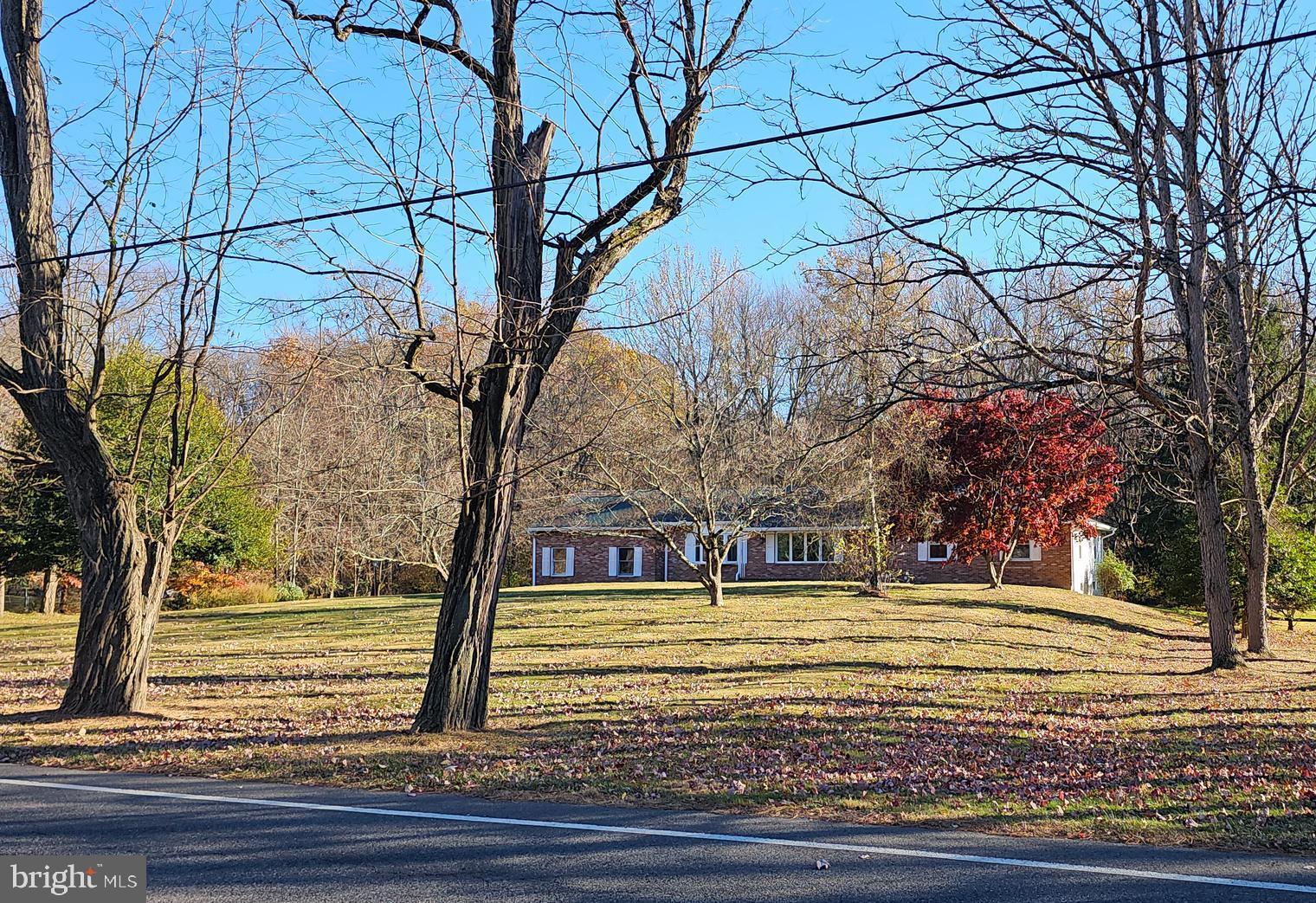 181 Edgebrook Road Robbinsville, NJ 08691 - Photo 11 of 67 a view of outdoor space with deck and tree