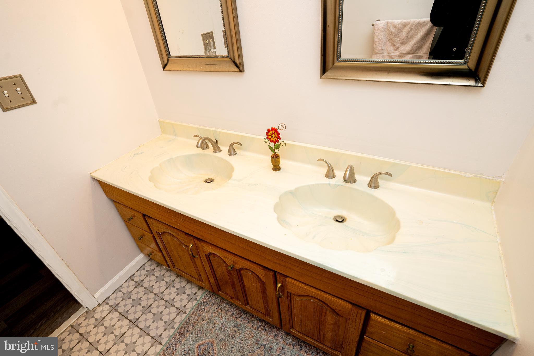 181 Edgebrook Road Robbinsville, NJ 08691 - Photo 20 of 67 a bathroom with a sink mirror and vanity