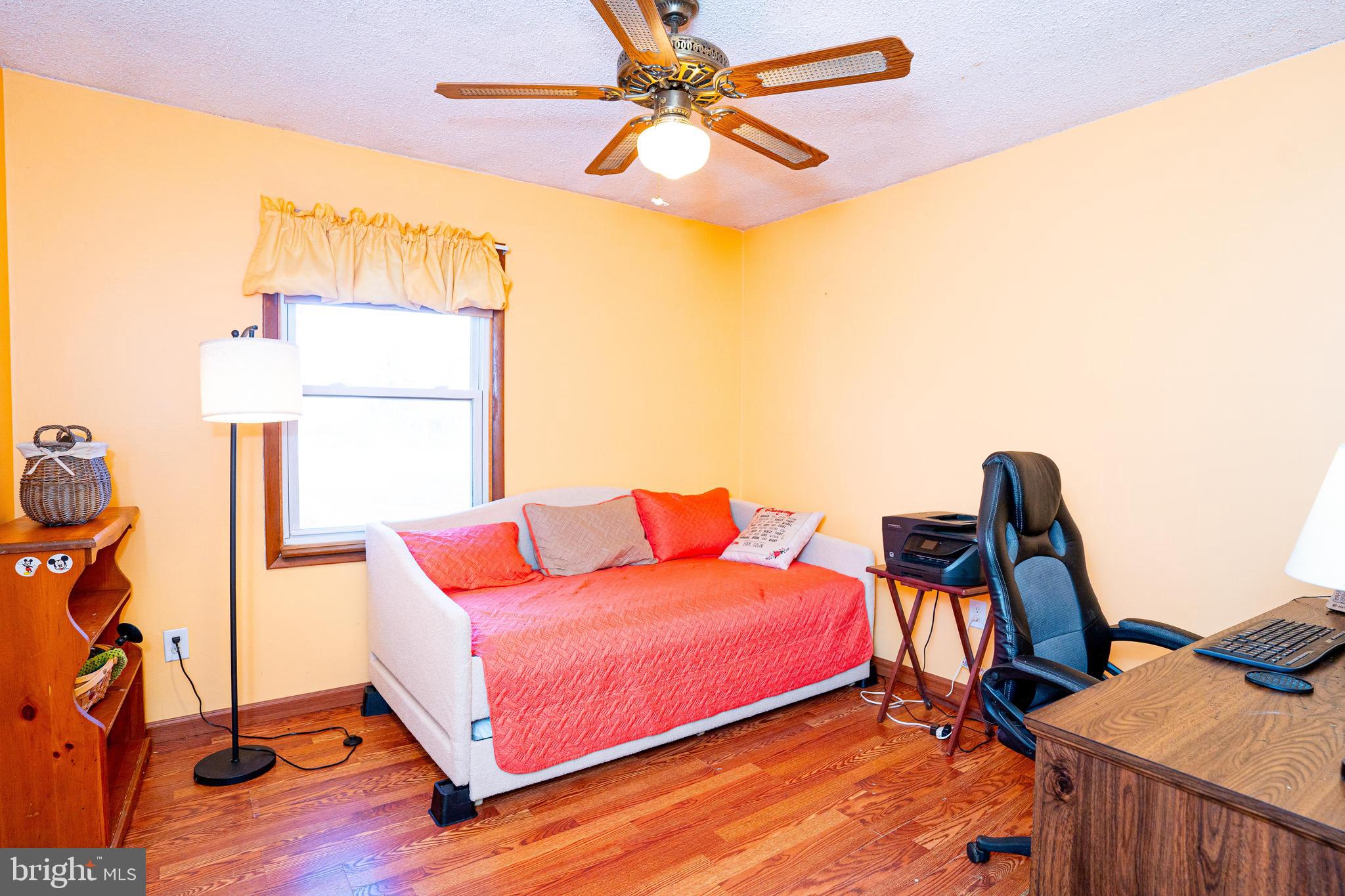 181 Edgebrook Road Robbinsville, NJ 08691 - Photo 46 of 67 a blue bed sitting in a room next to a window