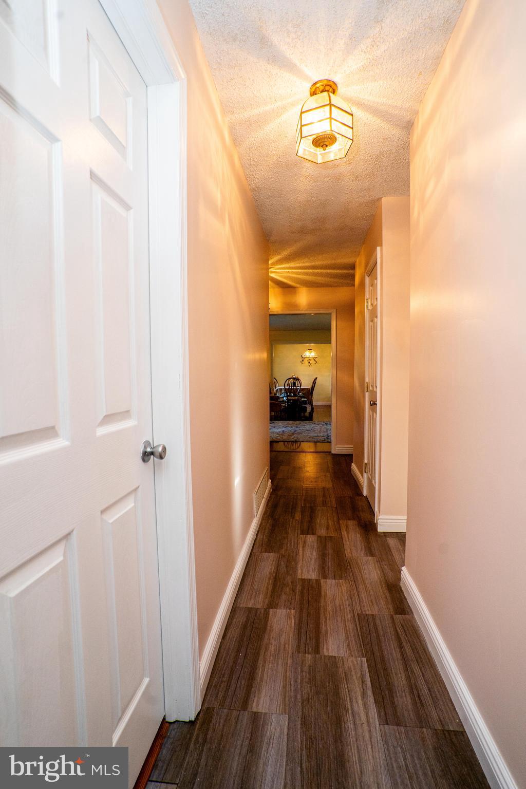 181 Edgebrook Road Robbinsville, NJ 08691 - Photo 50 of 67 a view of a hallway view with wooden floor