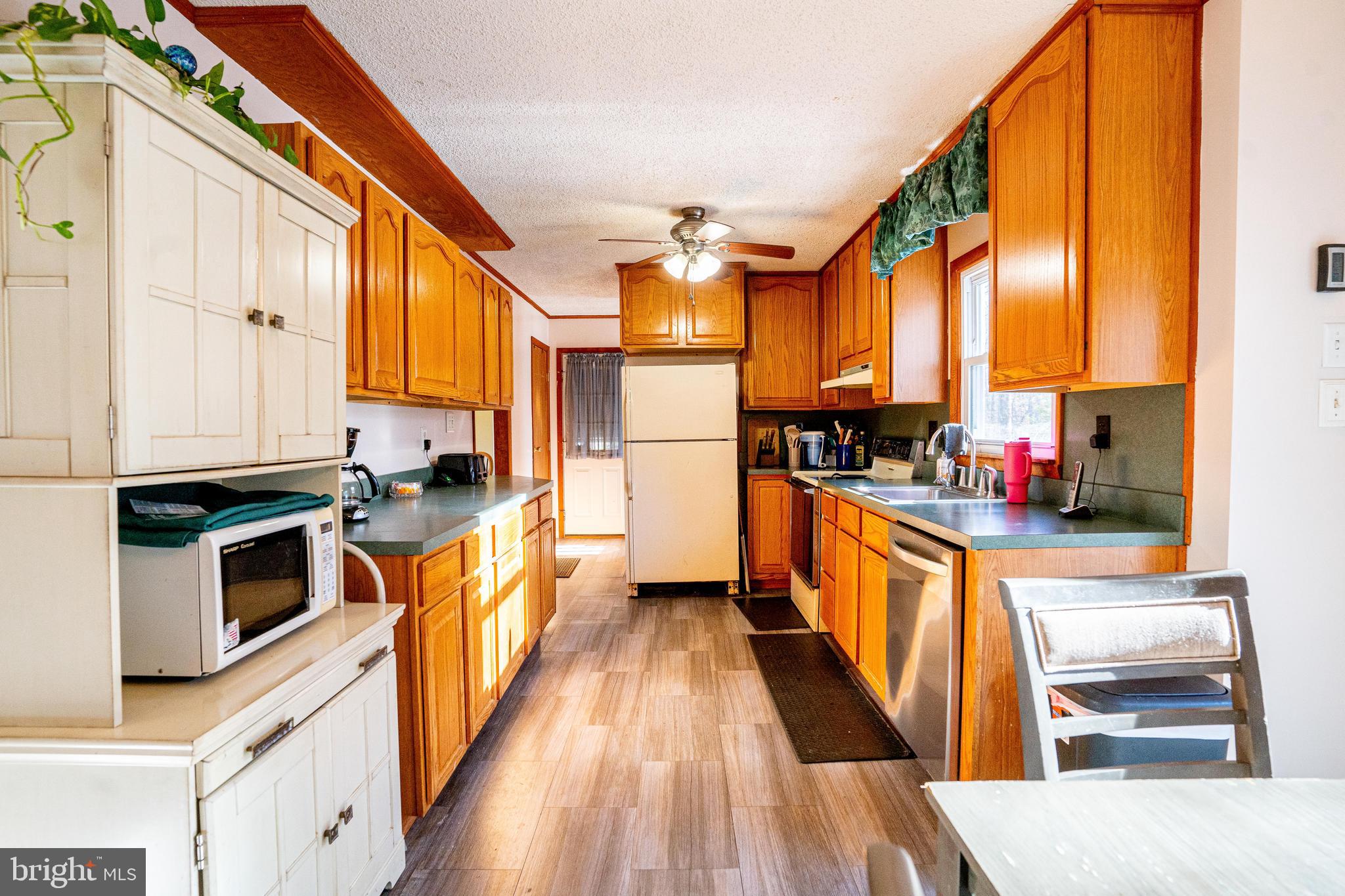 181 Edgebrook Road Robbinsville, NJ 08691 - Photo 55 of 67 a kitchen with stainless steel appliances a stove a sink and a refrigerator