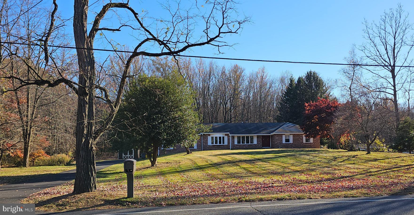 181 Edgebrook Road Robbinsville, NJ 08691 - Photo 8 of 67 a front view of a house with garden