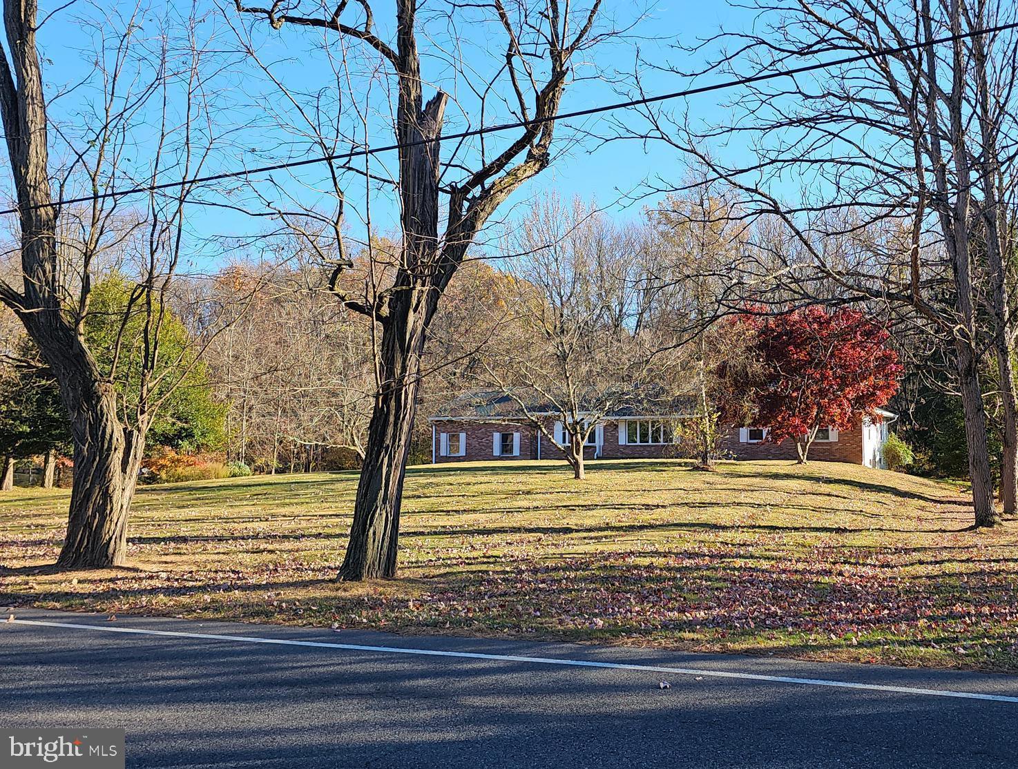 181 Edgebrook Road Robbinsville, NJ 08691 - Photo 10 of 67 a view of a yard with an trees
