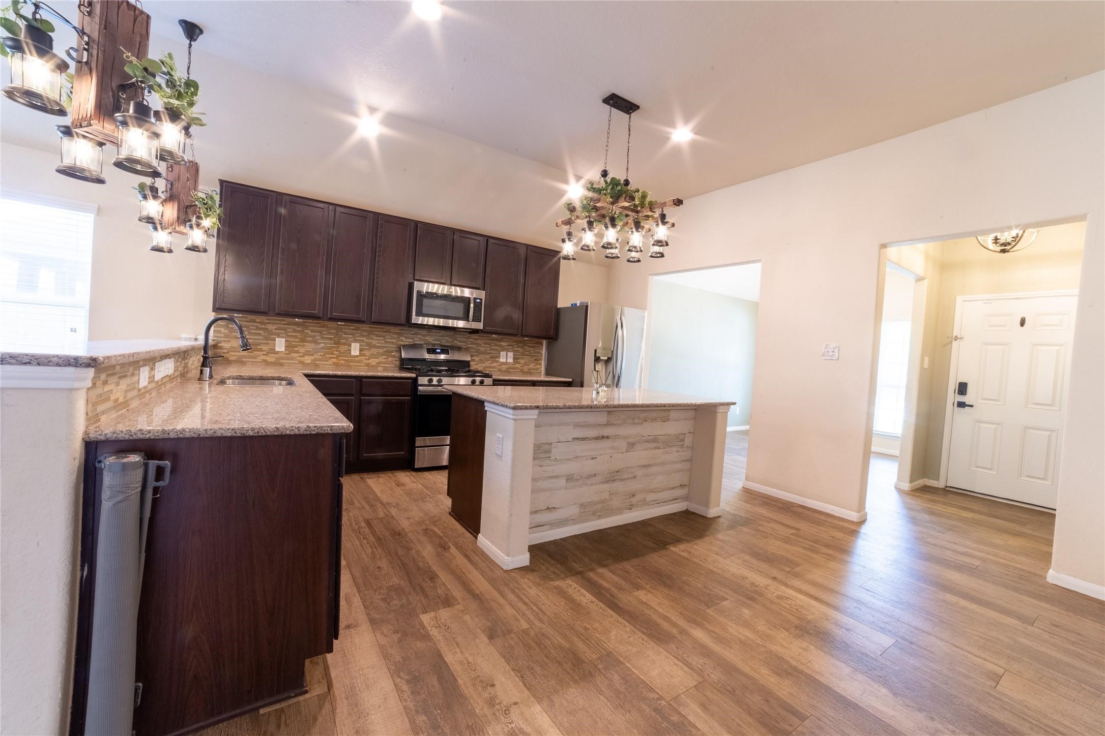 10510 Chestnut Path Way Tomball, TX 77375 - Photo 5 of 18 Spacious kitchen updated lighting