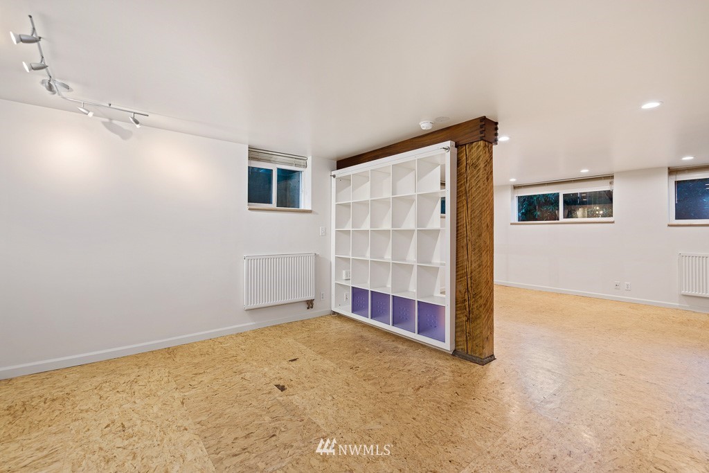 428 Northwest 45th Street Seattle, WA 98107 - Photo 13 of 26 a view of an empty room with cabinet and a window