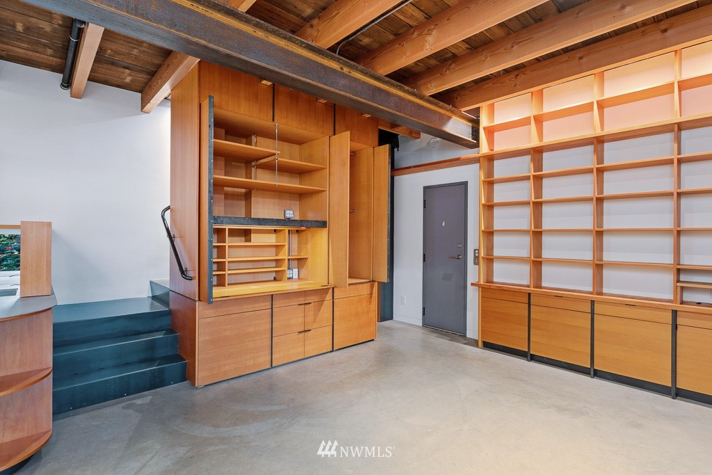428 Northwest 45th Street Seattle, WA 98107 - Photo 17 of 26 a view of an empty room with cabinet and mirrors