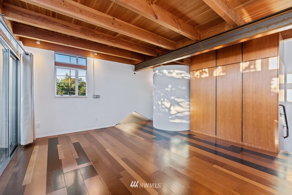 428 Northwest 45th Street Seattle, WA 98107 - Photo 24 of 26 a view of empty room with wooden floor