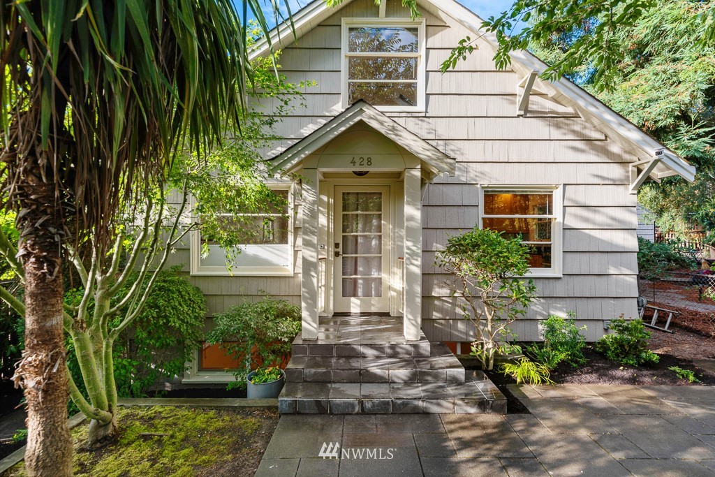 428 Northwest 45th Street Seattle, WA 98107 - Photo 5 of 26 a front view of a house with garden