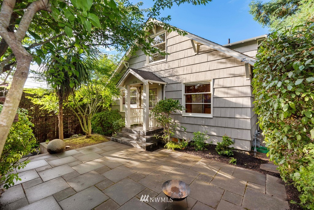 428 Northwest 45th Street Seattle, WA 98107 - Photo 6 of 26 a backyard of a house with yard and outdoor seating