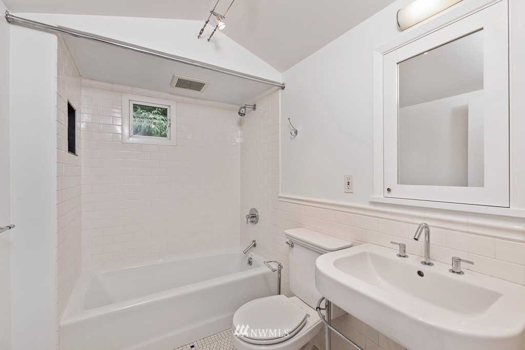 428 Northwest 45th Street Seattle, WA 98107 - Photo 10 of 26 a bathroom with a sink toilet and bathtub