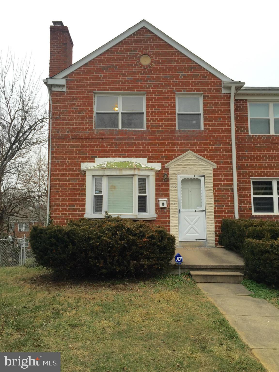980 Masefield Road Baltimore, MD 21207 - Photo 1 of 5 a house view with a garden space