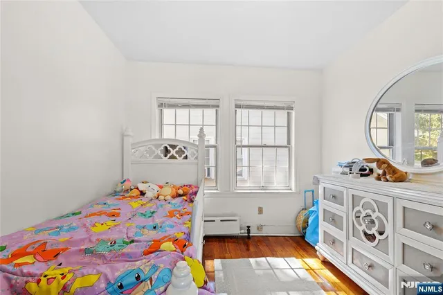 a very nice looking room with a baby crib