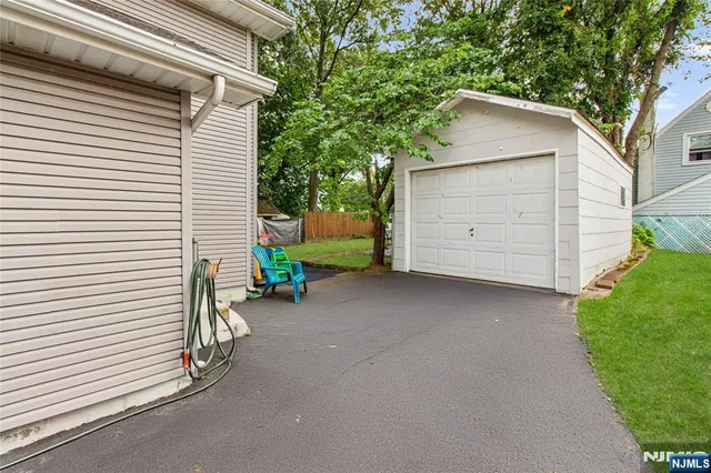 a view of a house with a garage