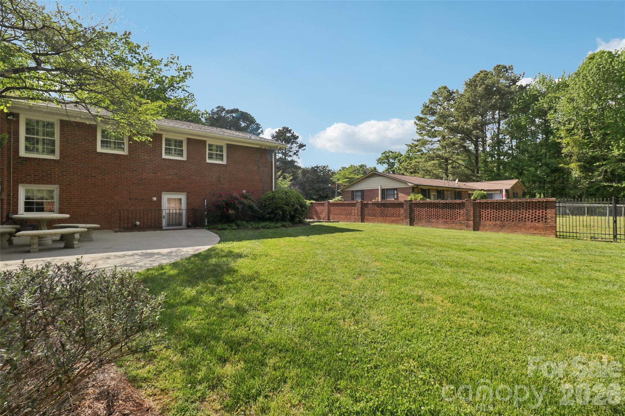 1002 Ridge Street Albemarle, NC 28001 - Photo 43 of 45 a view of a house with backyard and a tree