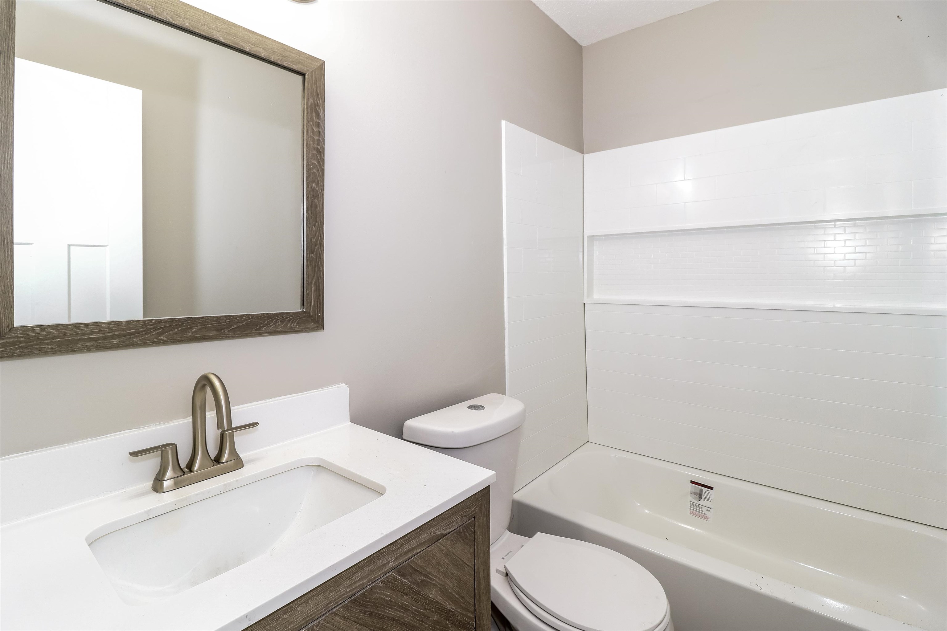 3917 Kerwin Drive Memphis, TN 38128 - Photo 14 of 16 a bathroom with a sink toilet and shower