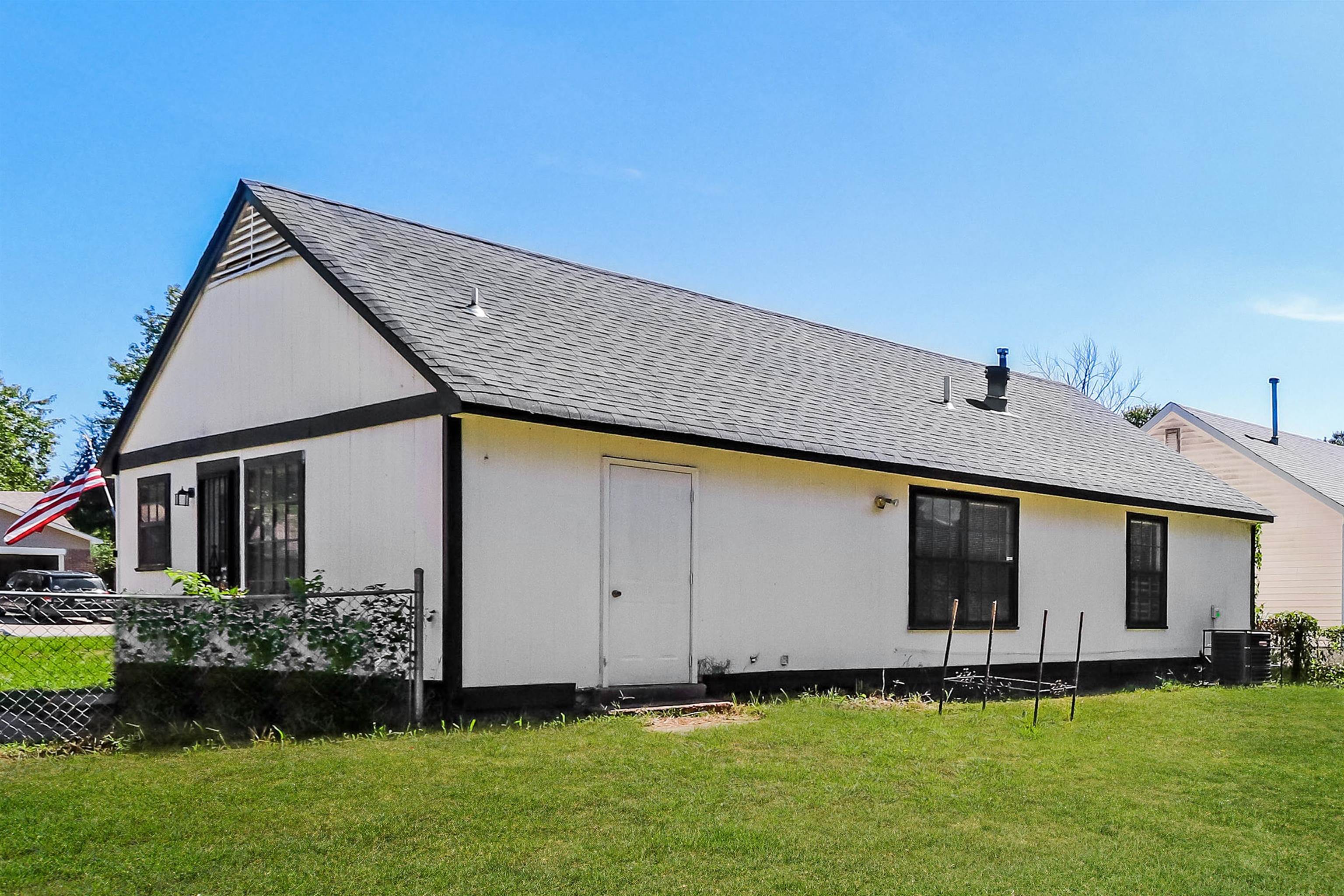 3917 Kerwin Drive Memphis, TN 38128 - Photo 15 of 16 a aerial view of a house with a garden and yard
