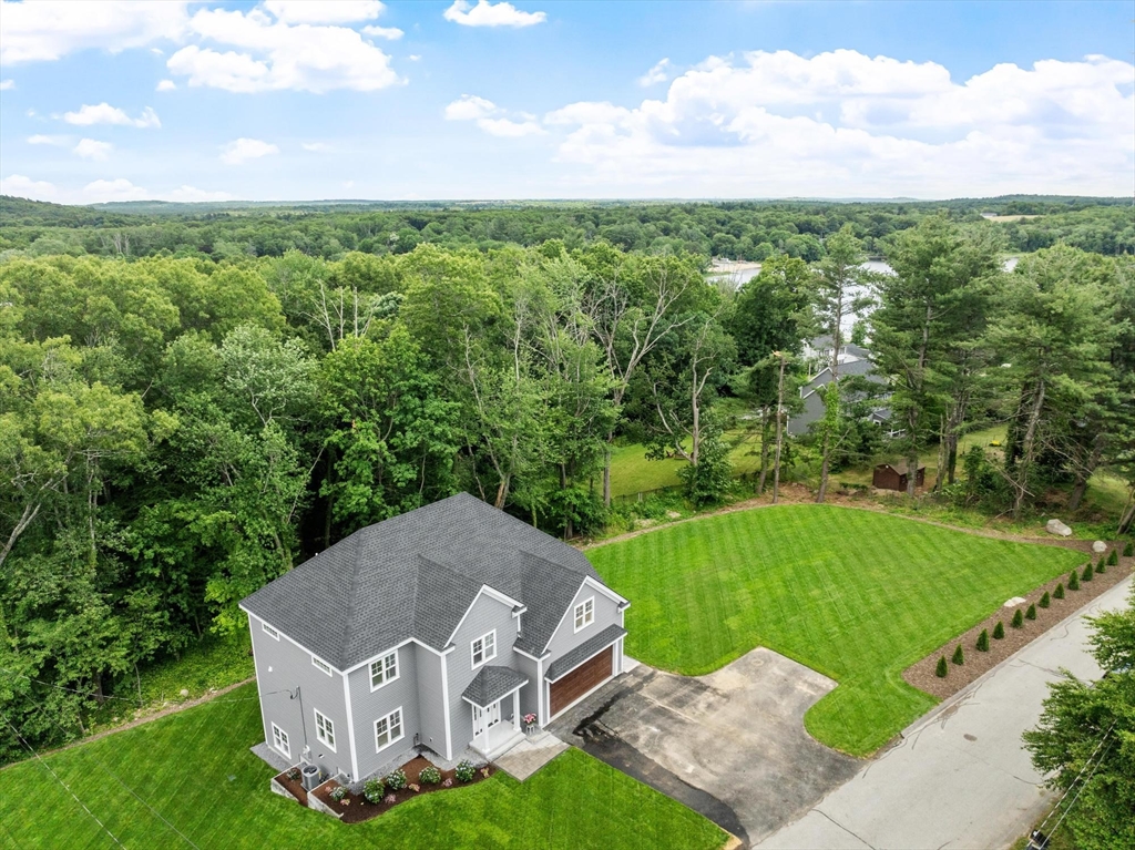 37 Dogwood Road Littleton, MA 01460 - Photo 26 of 36 a view of a house with a yard