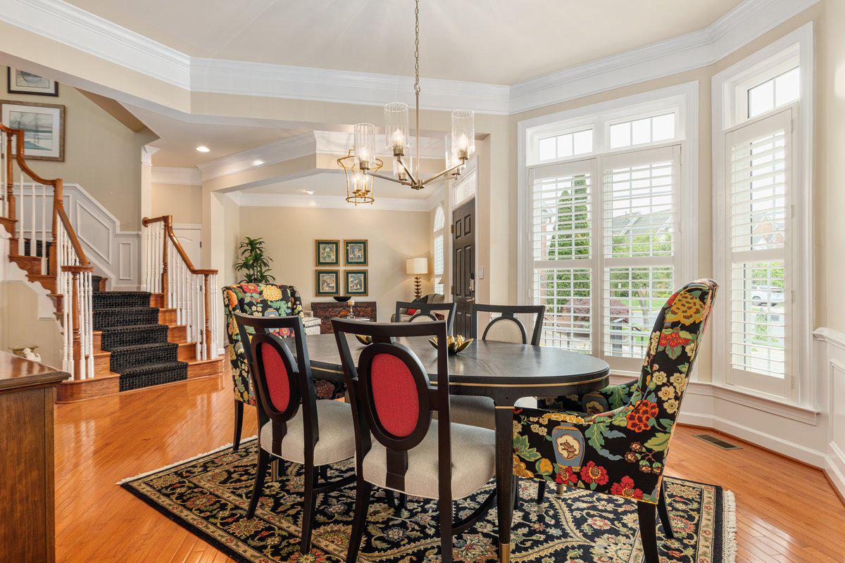 19194 Greystone Square Leesburg, VA 20176 - Photo 9 of 96 Hardwood stairs with carpet runner