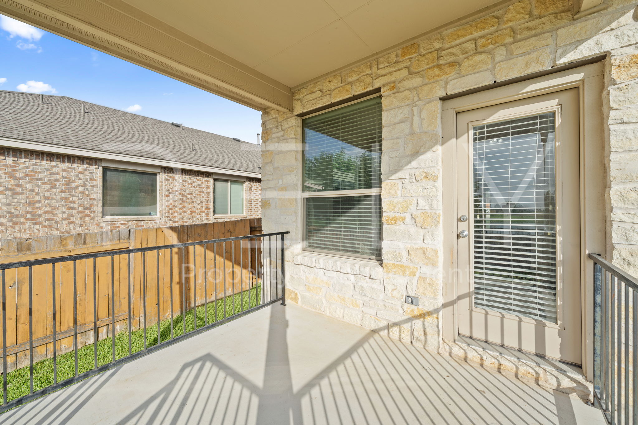1405 Sunny Meadows Loop Georgetown, TX 78626 - Photo 37 of 40 A quiet covered patio provides an inviting outdoor space, offering privacy and a tranquil escape.