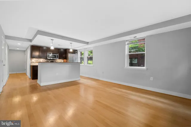a view of a kitchen with a sink cabinets and a kitchen