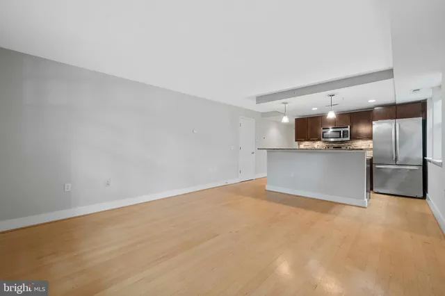 a view of a kitchen with a sink