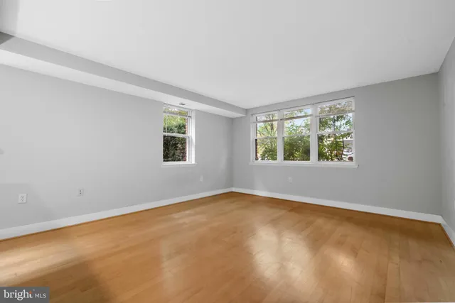 an empty room with windows