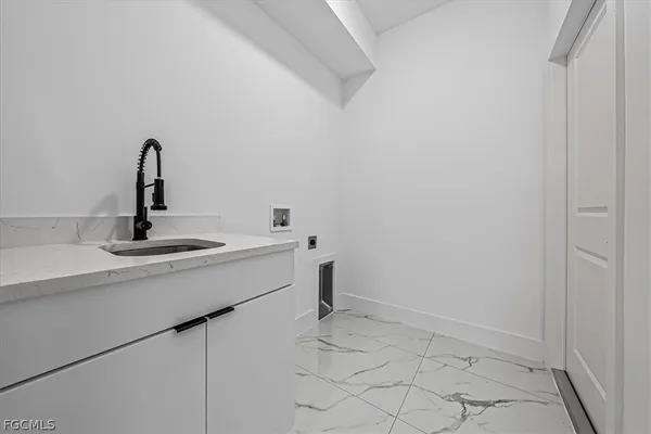 a bathroom with a sink and vanity