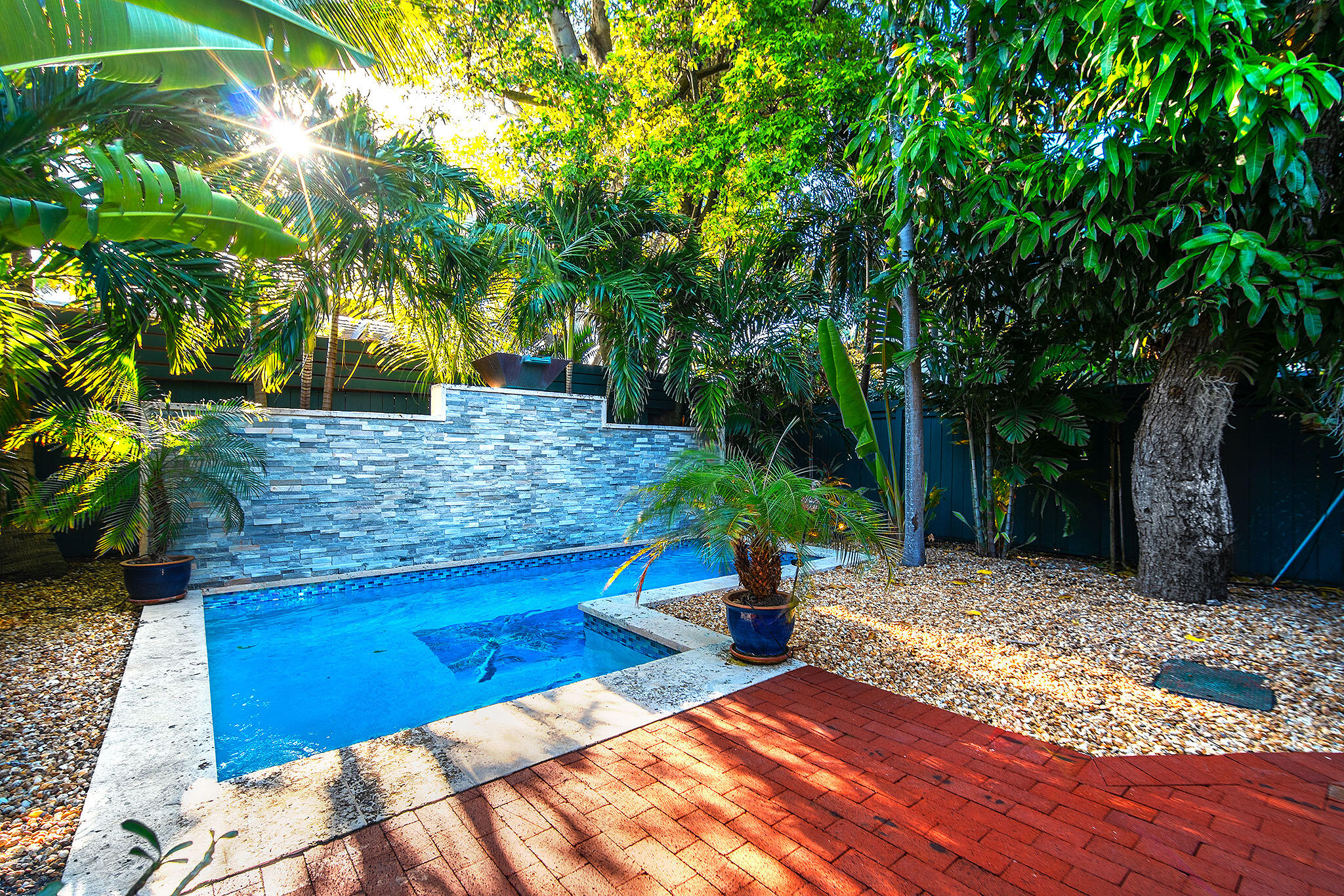 1116 Packer Street Key West, FL 33040 - Photo 13 of 57 a view of a backyard with a deck
