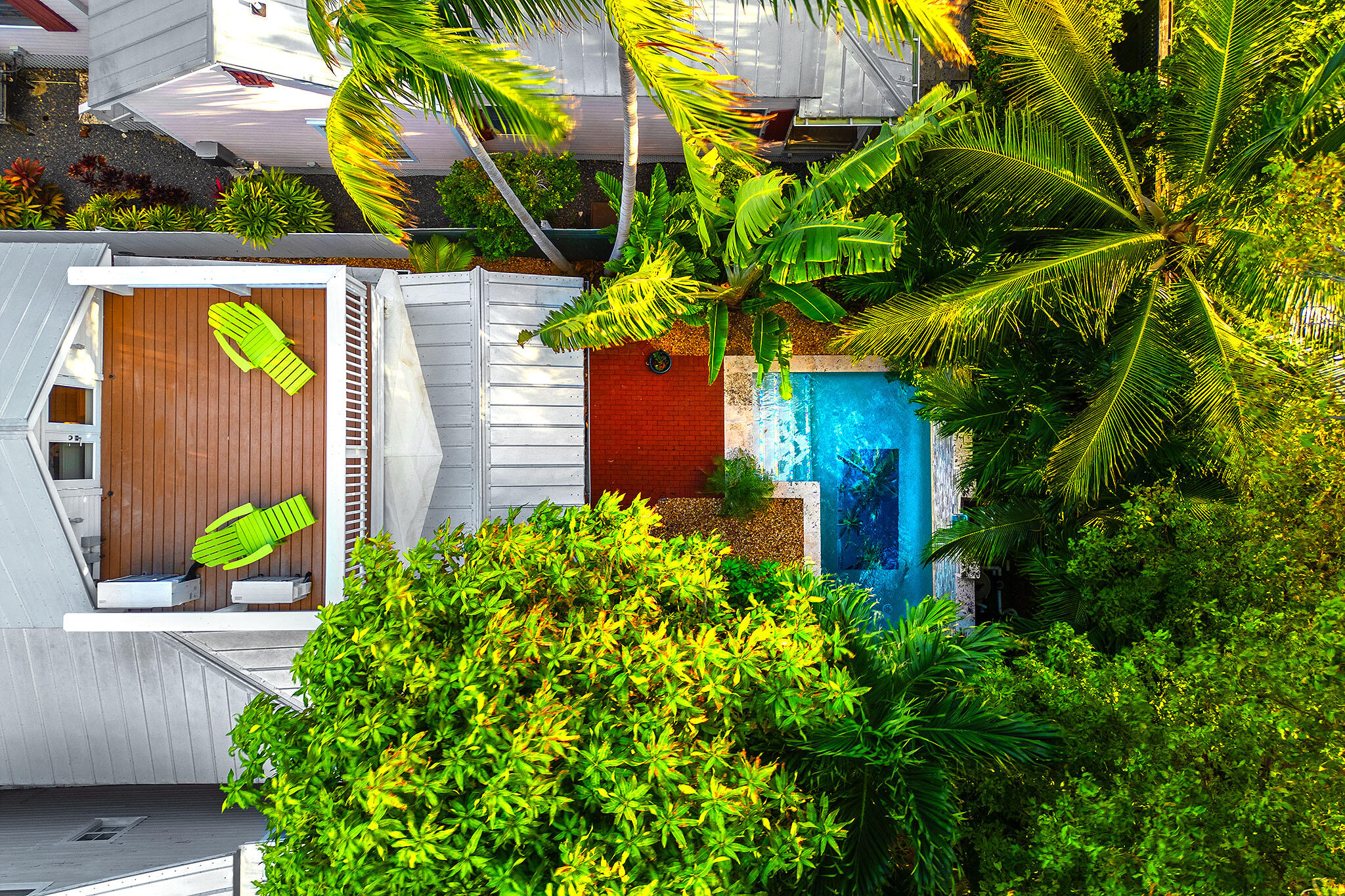 1116 Packer Street Key West, FL 33040 - Photo 19 of 57 a view of a house with potted plants