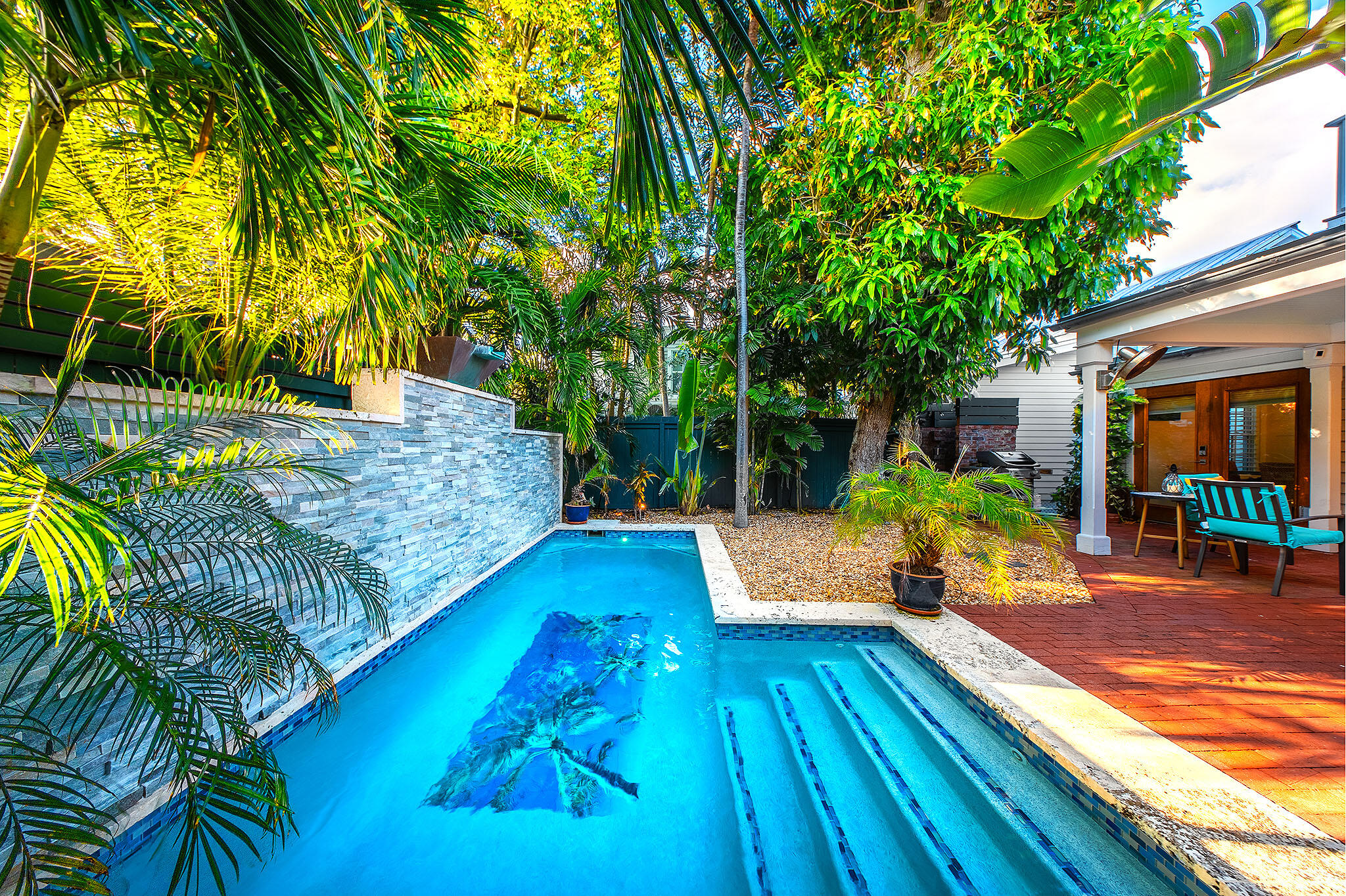 1116 Packer Street Key West, FL 33040 - Photo 26 of 57 a view of a house with backyard and sitting area