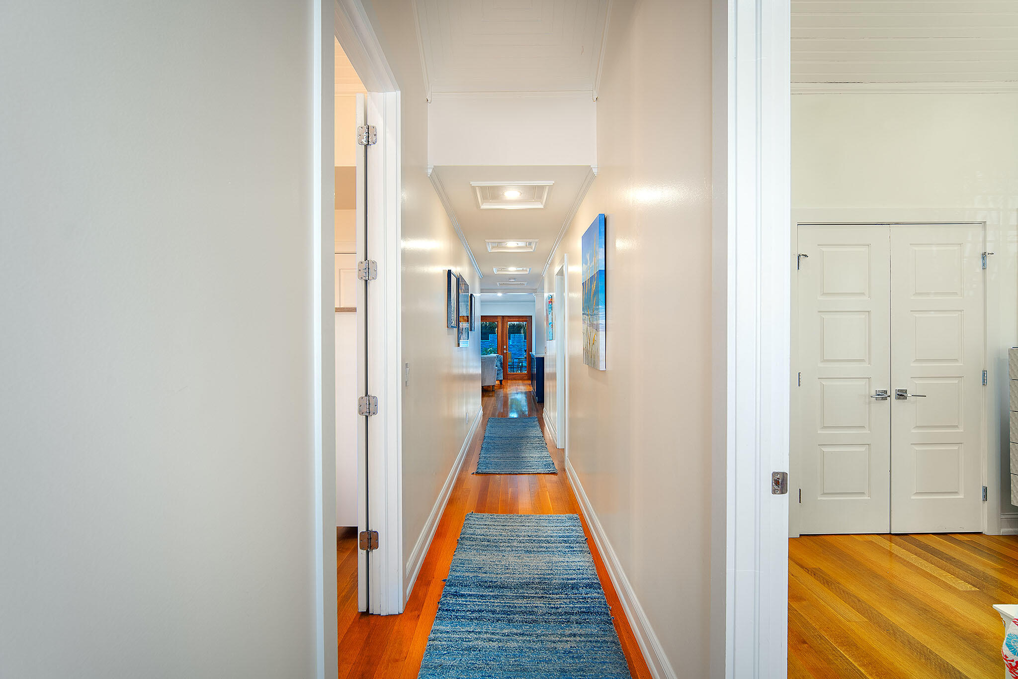 1116 Packer Street Key West, FL 33040 - Photo 29 of 57 a view of a hallway with wooden floor and staircase