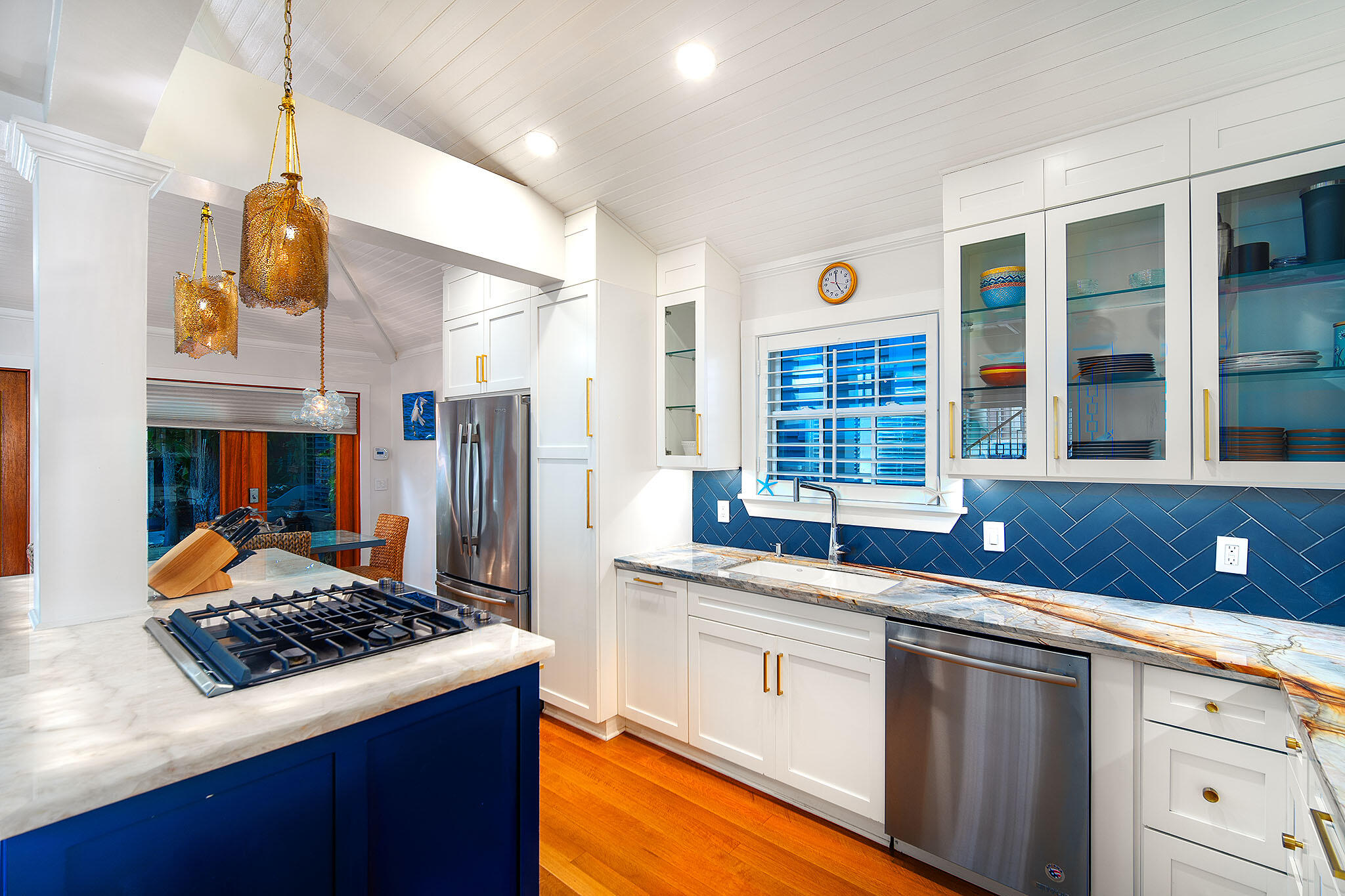 1116 Packer Street Key West, FL 33040 - Photo 31 of 57 a kitchen with stainless steel appliances granite countertop a stove and a sink