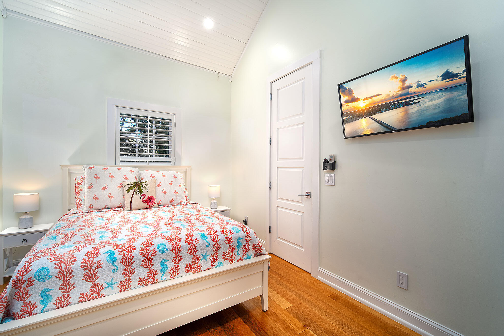 1116 Packer Street Key West, FL 33040 - Photo 46 of 57 a bedroom with a bed and a flat screen tv