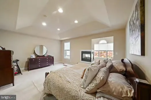 a en suite bathroom with a sink double vanity and mirror
