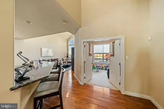 a view of a living room and dining room