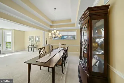 a room with furniture and a large window