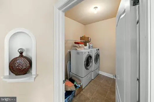 a view of a hallway with chairs