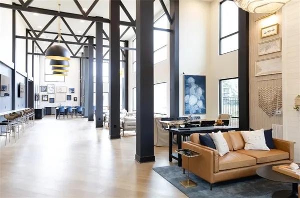 a view of a livingroom with furniture and window