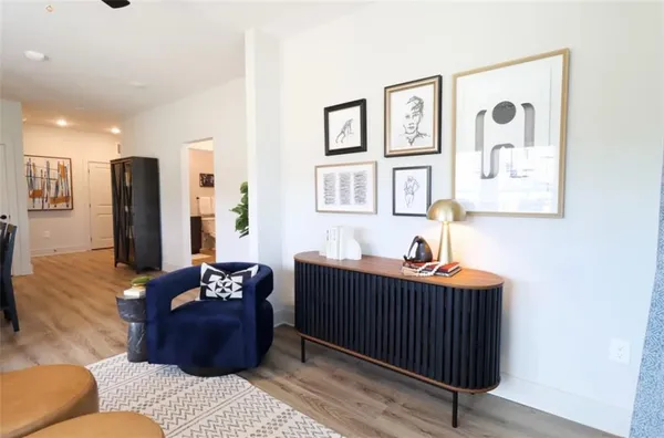 a living room with furniture and a window