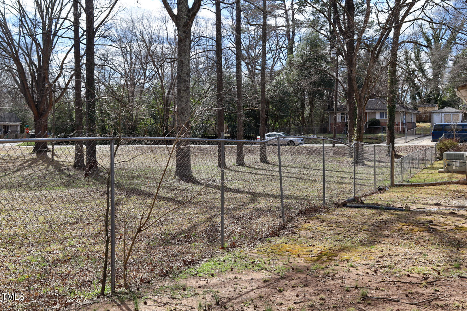 309 Cody Street Durham, NC 27703 - Photo 22 of 22 a view of a backyard with large trees